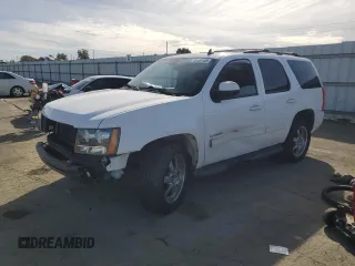 2014 Chevrolet Tahoe LT with VIN 1GNSCBE04ER229764, listed as a Copart auction lot 46456105 with 123,880 mi miles and Salvage title. Bid and sale history available at DreamBid. Image 1.
