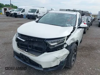 2018 Honda CR-V Touring with VIN 2HKRW2H91JH665241, listed as a IAAI auction lot 42638694 with 62,066 mi miles and . Bid and sale history available at DreamBid. Image 6.