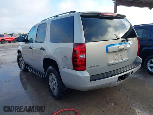 2007 Chevrolet Tahoe LS z VIN 1GNEC130X7R164139, wystawiony jako IAAI lot #42450827 z przebiegiem 232 144 mil mil oraz . Historia ofert i sprzedaży dostępna na DreamBid. Obrazek 3.