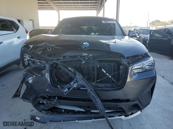 2022 BMW X4 xDrive30i with VIN 5UX33DT09N9L93053, listed as a Copart auction lot 71710692 with 0 mi miles. Bid and sale history available at carsss.com. Image 5.