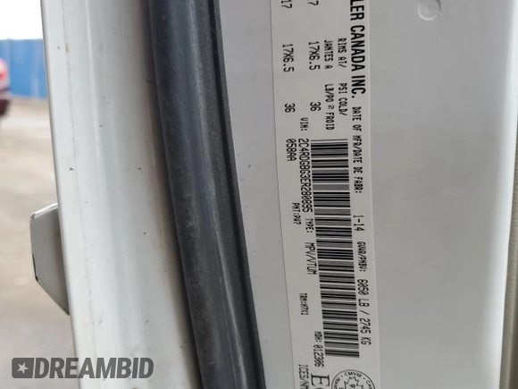 2014 Dodge Grand Caravan American Value with VIN 2C4RDGBG3ER280895, listed as a Copart auction lot 54351905 with 266,418 mi miles and Clean Title. Bid and sale history available at DreamBid. Image 13.