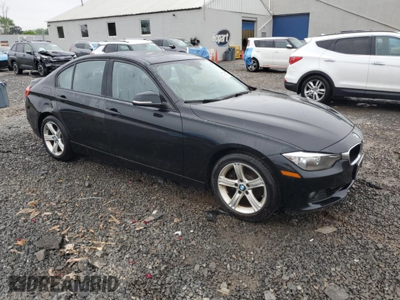 2013 BMW 3 Series 328i xDrive with VIN WBA3B5C53DF595177, listed as a Copart auction lot 57024375 with 124,873 mi miles and Salvage title. Bid and sale history available at DreamBid. Image 4.