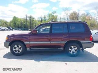2002 Toyota Land Cruiser with VIN JTEHT05J422022565, listed as a IAAI auction lot 42042565 with 550,000 mi miles. Bid and sale history available at carsss.com. Image 14.