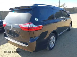 2016 Toyota Sienna XLE with VIN 5TDYK3DCXGS762035, listed as a IAAI auction lot 41664706 with 109,415 mi miles. Bid and sale history available at carsss.com. Image 4.