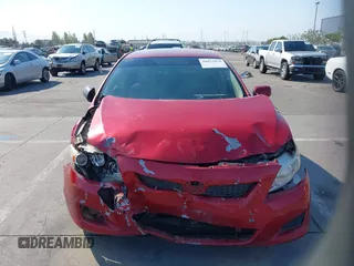2009 Toyota Corolla with VIN 1NXBU40E99Z089505, listed as a IAAI auction lot 39832879 with 197,912 mi miles. Bid and sale history available at carsss.com. Image 12.