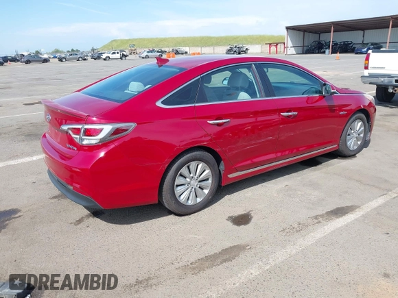 2016 Hyundai Sonata Hybrid SE with VIN KMHE24L18GA026079, listed as a IAAI auction lot 42051741 with 116,076 mi miles. Bid and sale history available at carsss.com. Image 4.