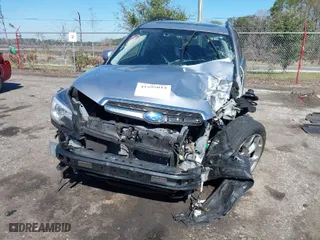 2017 Subaru Forester Touring with VIN JF2SJAWC7HH523883, listed as a IAAI auction lot 41595014 with 74,654 mi miles. Bid and sale history available at carsss.com. Image 6.