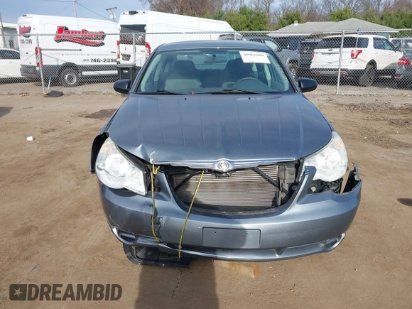 2008 Chrysler Sebring LX z VIN 1C3LC46K38N156346, wystawiony jako IAAI lot #40965609 z przebiegiem Nie podano mil oraz . Historia ofert i sprzedaży dostępna na DreamBid. Obrazek 13.