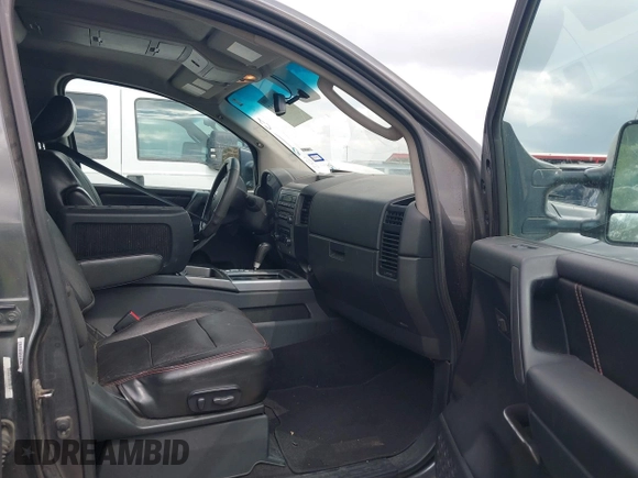 2011 Nissan Titan Pro-4X with VIN 1N6BA0EC3BN320795, listed as a IAAI auction lot 41868113 with 183,919 mi miles and . Bid and sale history available at DreamBid. Image 5.