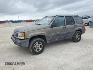 1998 Jeep Grand Cherokee Laredo with VIN 1J4GZ58S6WC137968, listed as a Copart auction lot 84083454 with 0 mi miles and Non Repairable. Bid and sale history available at carsss.com. Image 1.