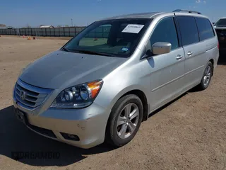 2008 Honda Odyssey Touring with VIN 5FNRL38918B059770, listed as a IAAI auction lot 41920865 with 231,599 mi miles. Bid and sale history available at carsss.com. Image 6.