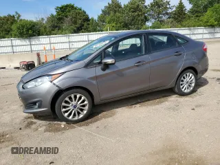2014 Ford Fiesta SE z VIN 3FADP4BJ0EM189740, wystawiony jako Copart lot #58180875 z przebiegiem 82 004 mil mil oraz Szkoda całkowita • Salvage title. Historia ofert i sprzedaży dostępna na DreamBid. Obrazek 1.