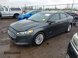 2015 Ford Fusion SE Hybrid with VIN 3FA6P0LU9FR184907, listed as a IAAI auction lot 42119737 with 153,255 mi miles and . Bid and sale history available at DreamBid. Image 18.