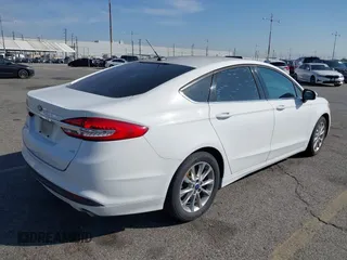 2017 Ford Fusion SE with VIN 3FA6P0H78HR235738, listed as a IAAI auction lot 41604054 with 172,896 mi miles. Bid and sale history available at carsss.com. Image 4.