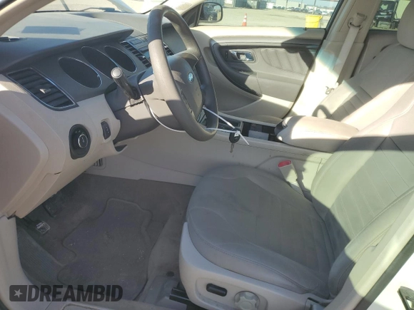 2011 Ford Taurus SE with VIN 1FAHP2DWXBG173095, listed as a Copart auction lot 89089415 with 136,305 mi miles and Clean Title. Bid and sale history available at DreamBid. Image 7.