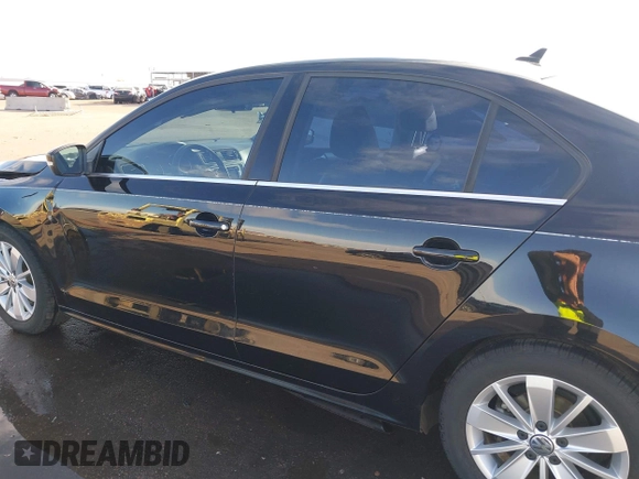 2015 Volkswagen Jetta Sedan 1.8T SE with VIN 3VWD17AJ9FM341950, listed as a IAAI auction lot 41778772 with 121,954 mi miles. Bid and sale history available at carsss.com. Image 14.