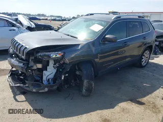 2014 Jeep Cherokee Limited with VIN 1C4PJLDS4EW283855, listed as a IAAI auction lot 41840848 with 143,686 mi miles. Bid and sale history available at carsss.com. Image 2.