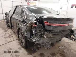 2015 Lincoln MKZ Hybrid z VIN 3LN6L2LU0FR624283, wystawiony jako IAAI lot #41402447 z przebiegiem 79 883 mil mil oraz . Historia ofert i sprzedaży dostępna na DreamBid. Obrazek 6.