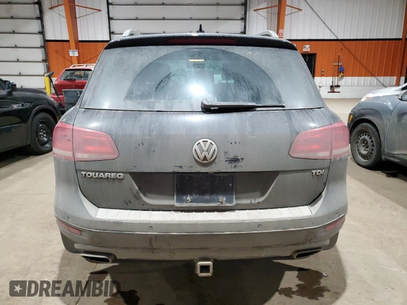 2013 Volkswagen Touareg Sport с VIN WVGEP9BP5DD008301, выставлен на аукционе Copart как лот 85085984 с пробегом 204 735 миль миль и Списание • Salvage title. История ставок и продаж доступна на DreamBid. Изображение 6.