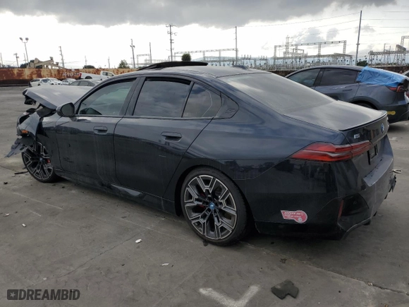 2024 BMW i5 eDrive40 with VIN WBY33FK03RCR93119, listed as a Copart auction lot 76124194 with 0 mi miles and Salvage Title. Bid and sale history available at carsss.com. Image 2.