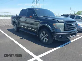 2013 Ford F-150 XL with VIN 1FTFW1ETXDKF25580, listed as a IAAI auction lot 41984341 with 256,014 mi miles. Bid and sale history available at carsss.com. Image 1.