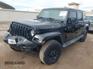 2021 Jeep Gladiator Freedom z VIN 1C6HJTAG4ML586999, wystawiony jako IAAI lot #41911751 z przebiegiem 81 030 mil mil oraz . Historia ofert i sprzedaży dostępna na DreamBid. Obrazek 17.