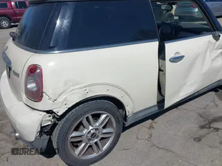 2011 MINI Hardtop with VIN WMWSU3C53BTX97140, listed as a IAAI auction lot 41861648 with 111,899 mi miles and . Bid and sale history available at DreamBid. Image 12.