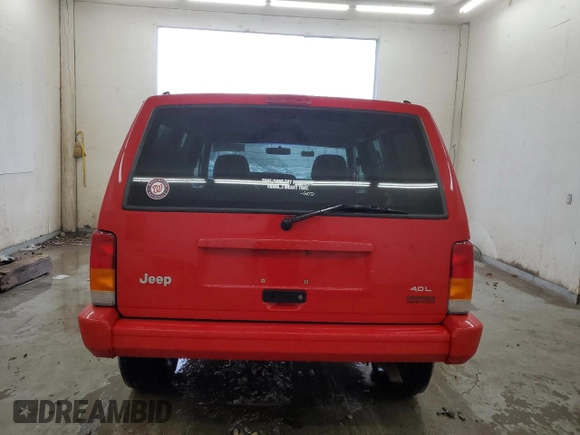 1998 Jeep Cherokee Sport with VIN 1J4FJ68S7WL148034, listed as a Copart auction lot 52436475 with 80,239 mi miles and Salvage Title. Bid and sale history available at carsss.com. Image 6.