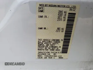 2022 Nissan LEAF SV with VIN 1N4AZ1CV1NC563433, listed as a Copart auction lot 54656955 with 10,604 mi miles and Salvage Title. Bid and sale history available at DreamBid. Image 14.