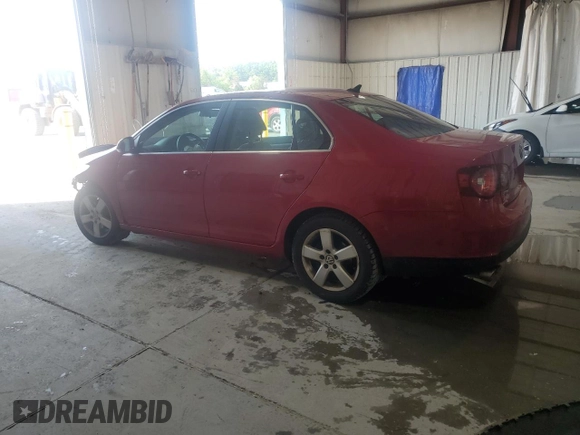 2009 Volkswagen Jetta SE z VIN 3VWRZ71KX9M127514, wystawiony jako Copart lot #59872955 z przebiegiem Nie podano mil oraz Szkoda całkowita • Salvage title. Historia ofert i sprzedaży dostępna na DreamBid. Obrazek 2.