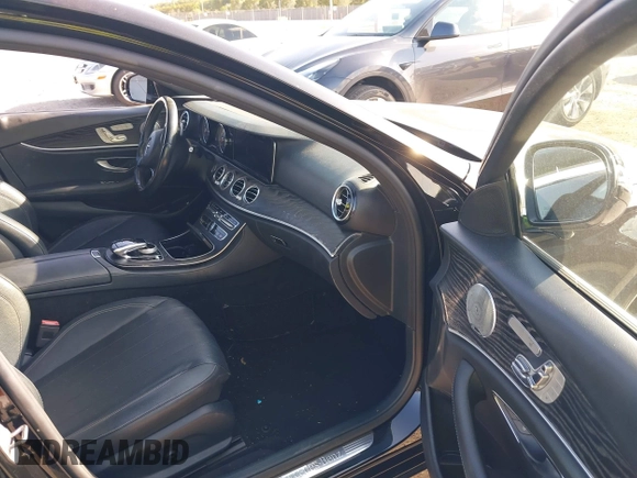 2018 Mercedes-Benz E 300 with VIN WDDZF4JB5JA380872, listed as a IAAI auction lot 42048785 with 94,574 mi miles and . Bid and sale history available at DreamBid. Image 5.