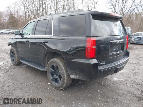 2018 Chevrolet Tahoe LT z VIN 1GNSKBKC7JR276427, wystawiony jako IAAI lot #41977418 z przebiegiem 152 007 mil mil oraz . Historia ofert i sprzedaży dostępna na DreamBid. Obrazek 3.