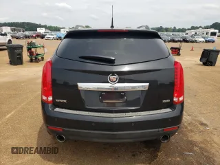 2014 Cadillac SRX Performance Collection z VIN 3GYFNCE38ES525883, wystawiony jako Copart lot #55085505 z przebiegiem 160 609 mil mil oraz Szkoda całkowita • Salvage title. Historia ofert i sprzedaży dostępna na DreamBid. Obrazek 6.