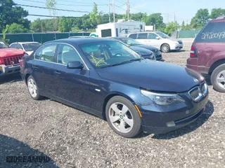 2008 BMW 5 Series 528xi with VIN WBANV13558CZ58594, listed as a IAAI auction lot 39716458 with 999,999 mi miles. Bid and sale history available at carsss.com. Image 1.