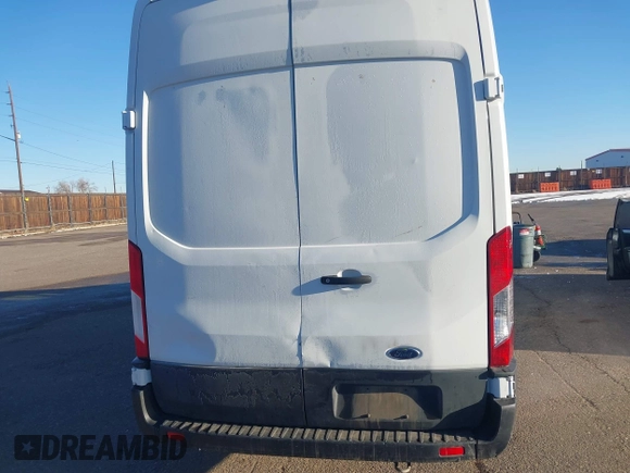 2023 Ford Transit Cargo with VIN 1FTBR3U86PKA39951, listed as a IAAI auction lot 41449397 with 46,883 mi miles and . Bid and sale history available at DreamBid. Image 16.