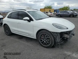 2017 Porsche Macan GTS with VIN WP1AG2A57HLB51772, listed as a Copart auction lot 55123715 with 130,576 mi miles and Salvage title. Bid and sale history available at DreamBid. Image 4.