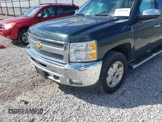 2013 Chevrolet Silverado 1500 LT with VIN 3GCPKSE77DG256115, listed as a IAAI auction lot 41984990 with 270,324 mi miles. Bid and sale history available at carsss.com. Image 6.