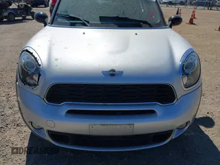 2014 MINI Countryman S with VIN WMWZC5C54EWP40882, listed as a IAAI auction lot 42633141 with 176,641 mi miles and . Bid and sale history available at DreamBid. Image 6.