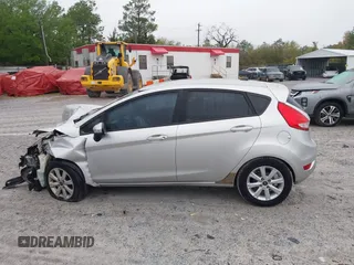 2013 Ford Fiesta SE with VIN 3FADP4EJ6DM107293, listed as a IAAI auction lot 41898229 with 129,694 mi miles. Bid and sale history available at carsss.com. Image 14.