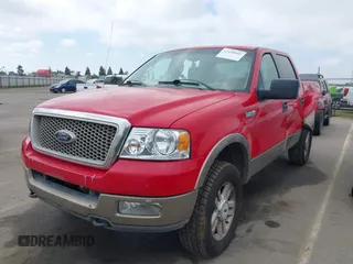 2004 Ford F-150 XLT with VIN 1FTPW14564KC89792, listed as a IAAI auction lot 41658885 with 219,012 mi miles. Bid and sale history available at carsss.com. Image 2.