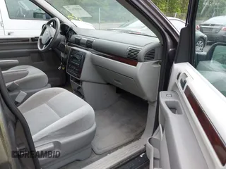 2006 Ford Freestar SEL z VIN 2FMZA52256BA51562, wystawiony jako IAAI lot #42197610 z przebiegiem 120 768 mil mil oraz . Historia ofert i sprzedaży dostępna na DreamBid. Obrazek 5.