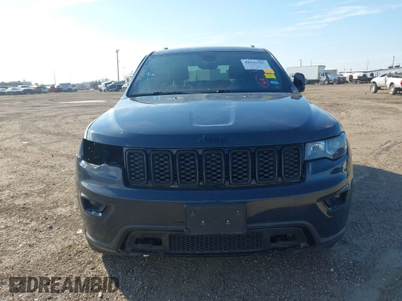 2018 Jeep Grand Cherokee Laredo E with VIN 1C4RJFAG4JC370502, listed as a IAAI auction lot 41342367 with 104,307 mi miles. Bid and sale history available at carsss.com. Image 13.