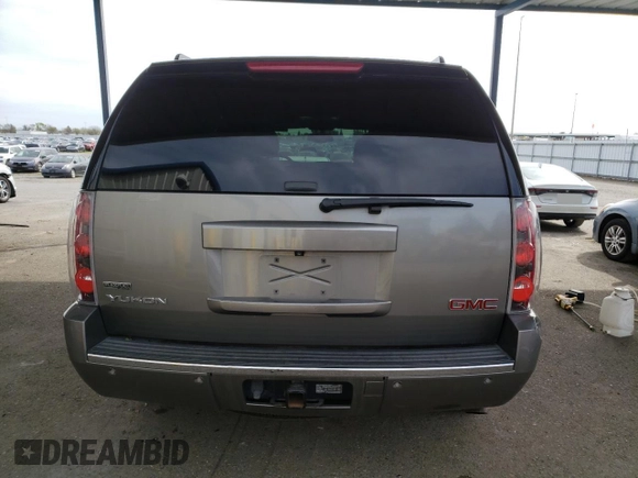 2012 GMC Yukon Denali with VIN 1GKS1EEFXCR236823, listed as a Copart auction lot 49830405 with 134,568 mi miles and Salvage Title. Bid and sale history available at carsss.com. Image 6.