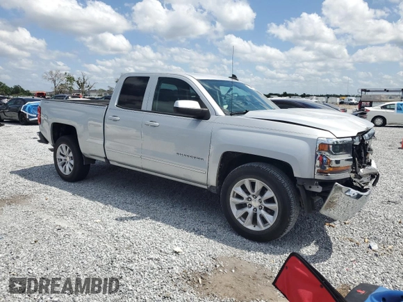 2018 Chevrolet Silverado 1500 LT with VIN 1GCRCREC1JZ354936, listed as a Copart auction lot 50747775 with 129,362 mi miles and Salvage Title. Bid and sale history available at DreamBid. Image 4.