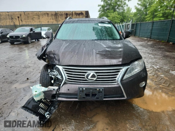 2014 Lexus RX 350 with VIN 2T2BK1BA4EC236769, listed as a Copart auction lot 58861175 with 15,737 mi miles and Salvage title. Bid and sale history available at DreamBid. Image 5.