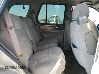 2003 GMC Envoy SLT z VIN 1GKDS13S032373020, wystawiony jako Copart lot #54986765 z przebiegiem 235 711 mil mil oraz Tytuł czysty. Historia ofert i sprzedaży dostępna na DreamBid. Obrazek 11.
