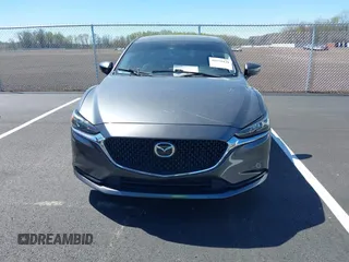 2020 Mazda 6 Grand Touring with VIN JM1GL1TY0L1522025, listed as a IAAI auction lot 41876429 with 68,101 mi miles and . Bid and sale history available at DreamBid. Image 12.
