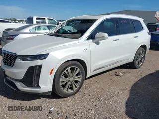 2021 Cadillac XT6 Premium Luxury z VIN 1GYKPCRS6MZ230499, wystawiony jako IAAI lot #41808404 z przebiegiem 86 933 mil mil oraz . Historia ofert i sprzedaży dostępna na DreamBid. Obrazek 20.