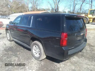 2019 Chevrolet Suburban LT with VIN 1GNSCHKCXKR405939, listed as a IAAI auction lot 41591475 with 106,554 mi miles and . Bid and sale history available at DreamBid. Image 3.