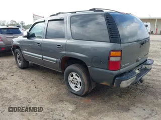 2002 Chevrolet Tahoe LT z VIN 1GNEK13Z42J203185, wystawiony jako IAAI lot #41940552 z przebiegiem 325 618 mil mil oraz . Historia ofert i sprzedaży dostępna na DreamBid. Obrazek 3.